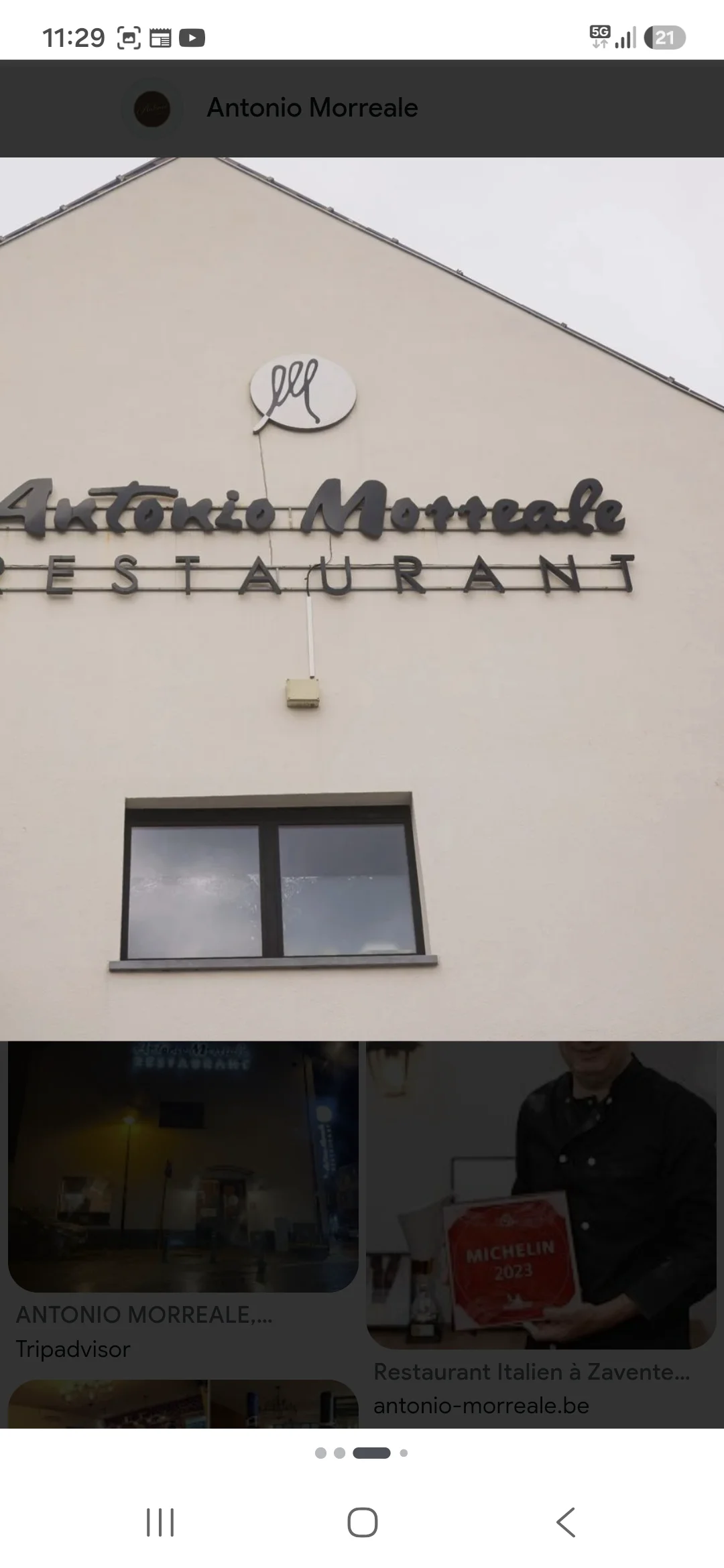 Façade beige avec l’enseigne Antonio Morreale Restaurant, visible dans une capture d’écran mobile.